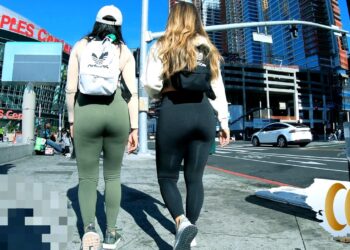 Two brunettes with tight spandex candid spy