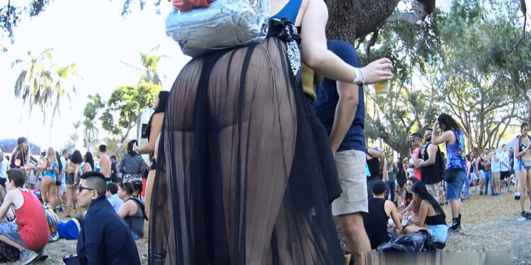 Rave Candid Babe In Black Sheer Bodysuit Exposes Big Ass